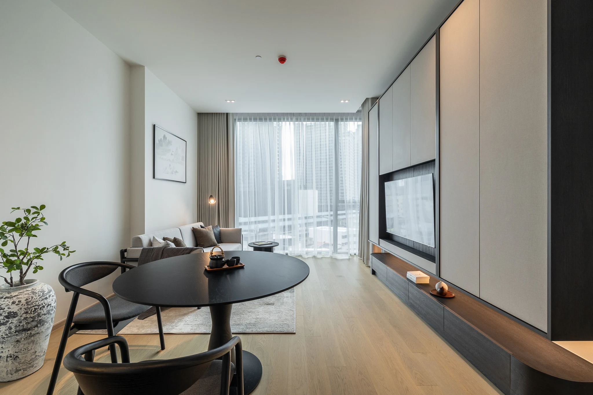 The Strand Thonglor — Warm Layered Residence
