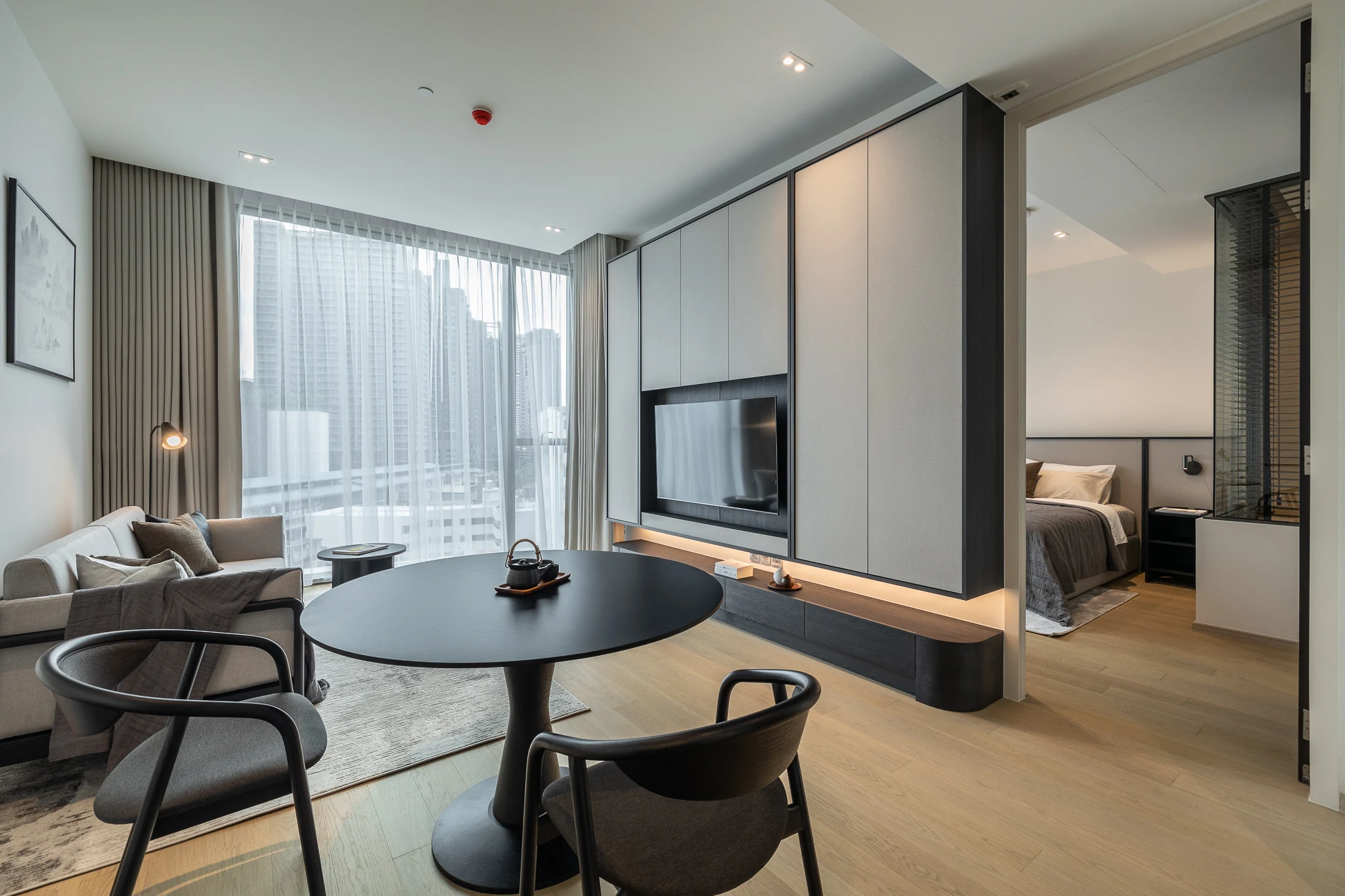 The Strand Thonglor — Warm Layered Residence